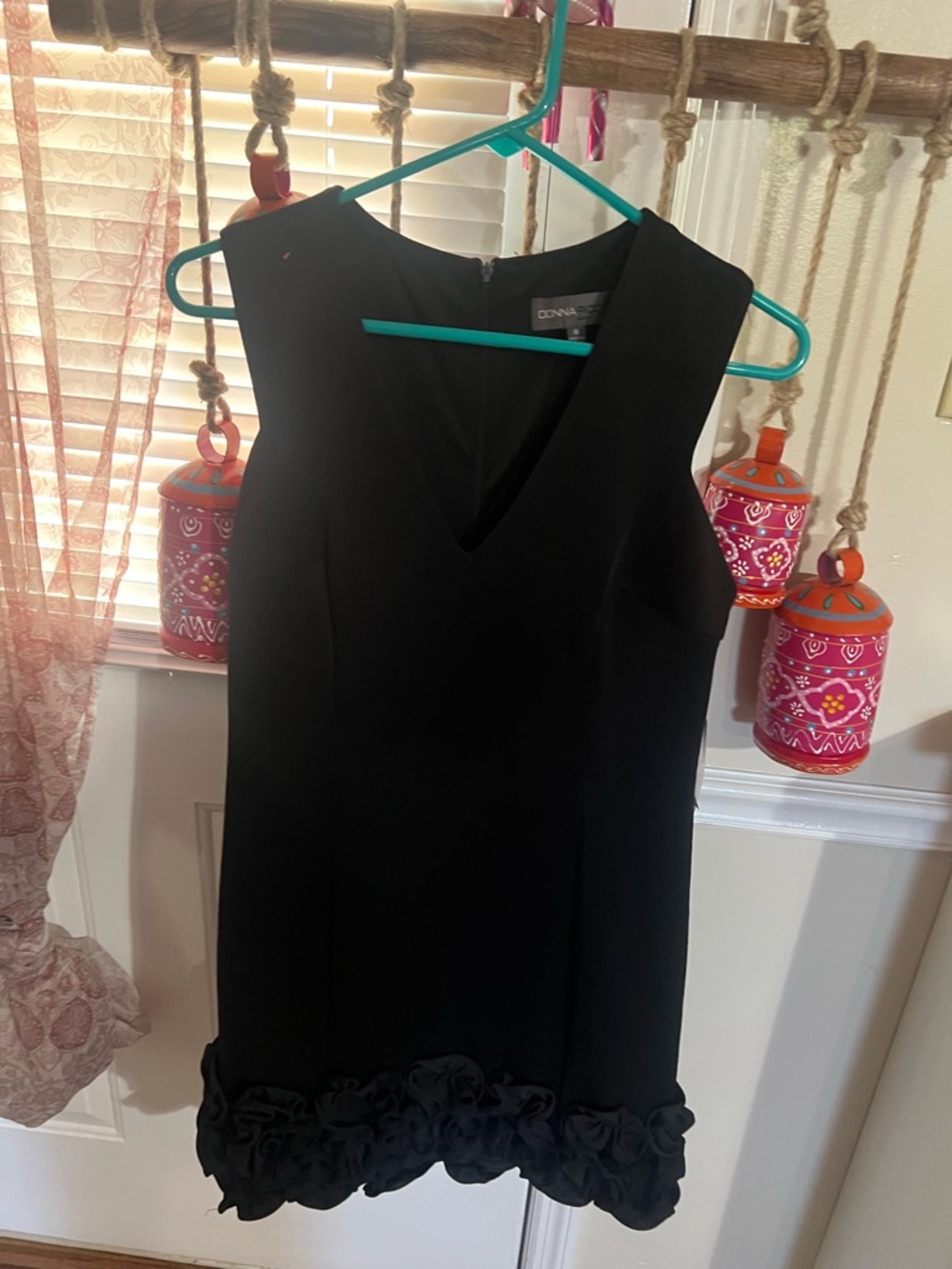 Donna Ricco Black Sleeveless V-Neck Mini Dress with Rosette Hem Trim